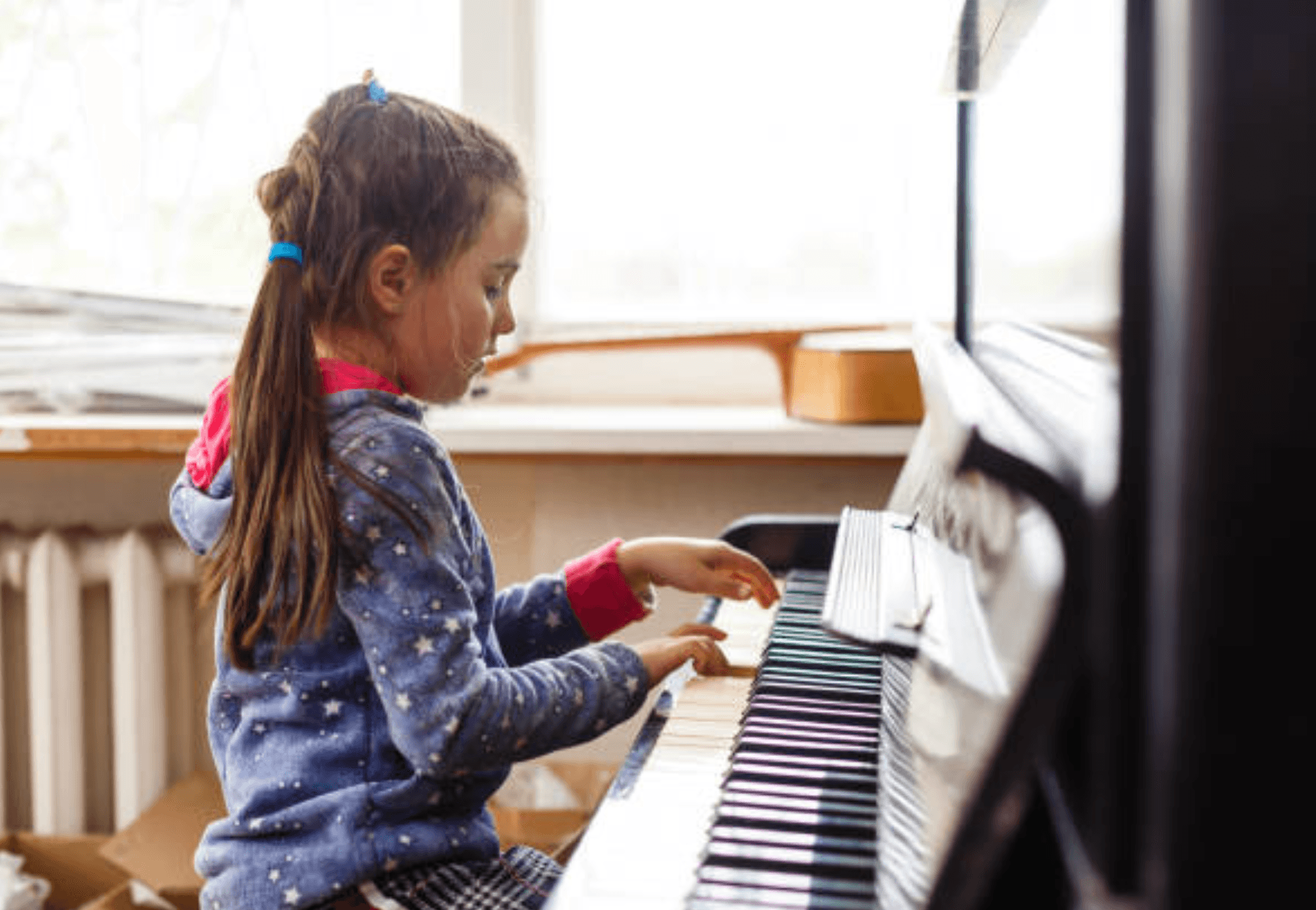 Child playing piano