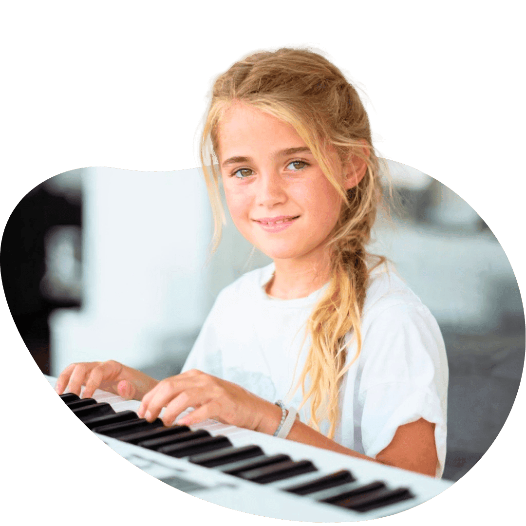 Child playing piano at home